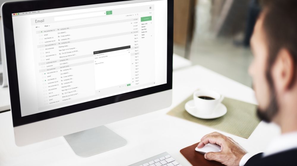 a business man sending emails online | it generates leads