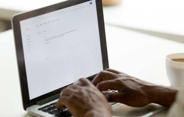 a man composing email on the laptop | Poor Spelling and Grammar