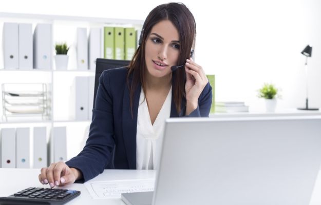a salewoman is making phone call online at the working table | Be persistent
