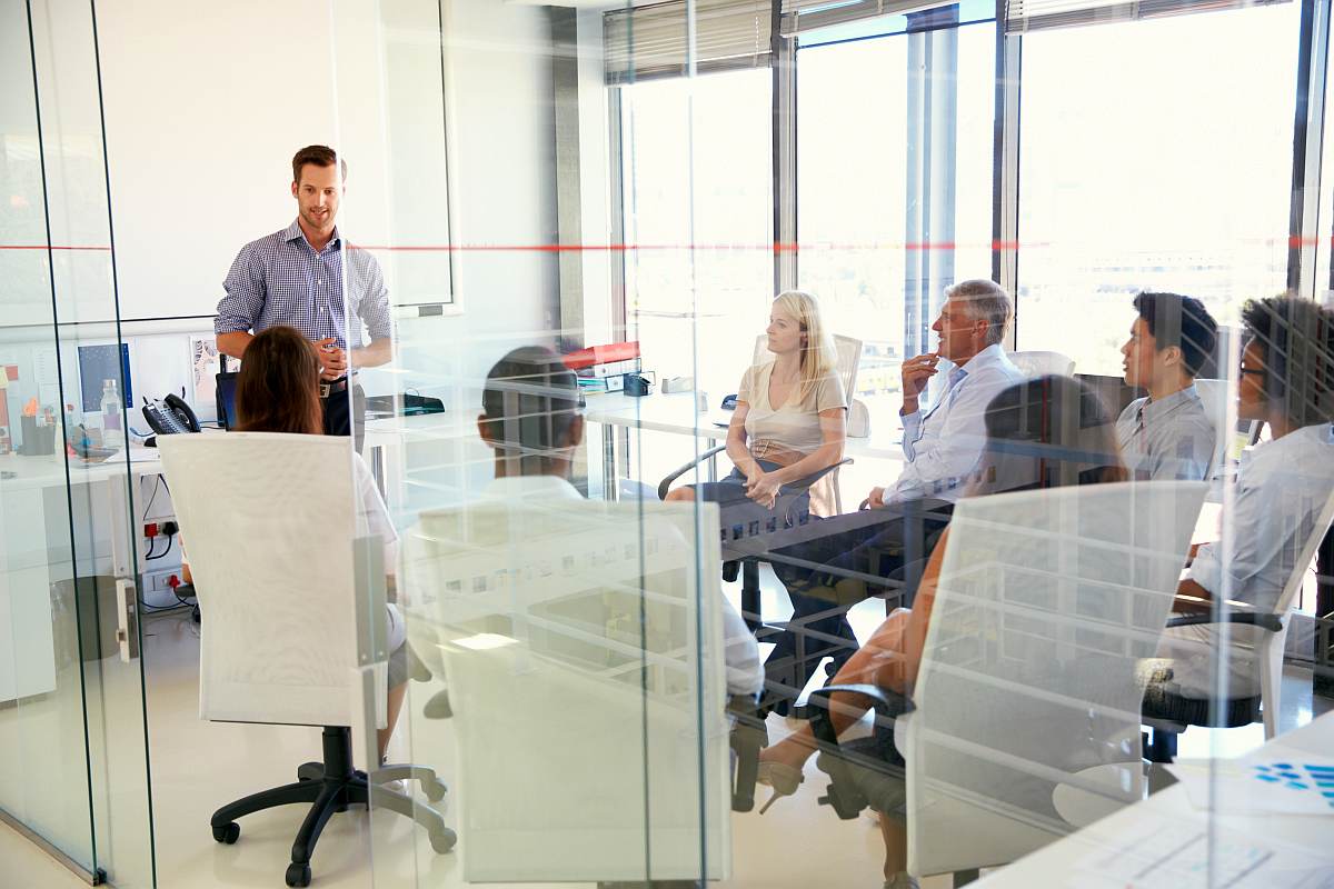 Business meting in modern room | The Sales Cadence Tool You Need To Generate More Leads