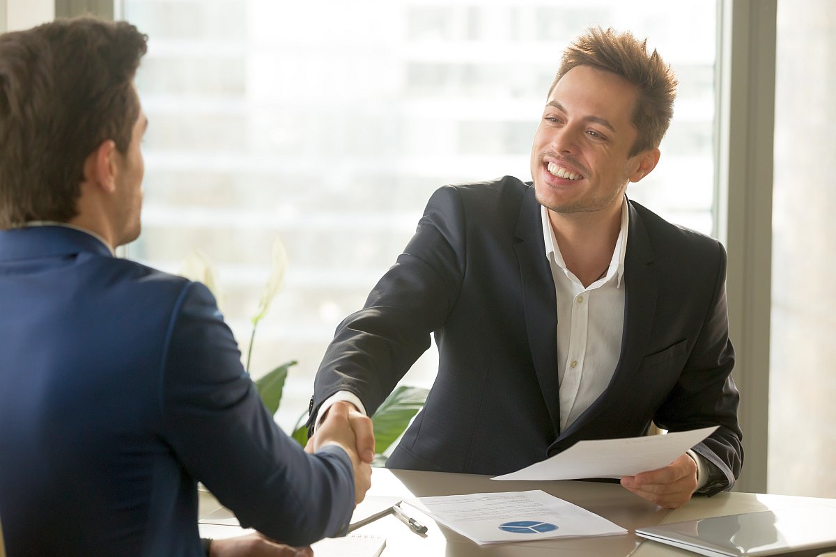 Businessman shaking hands| Five Myths of Prospecting
